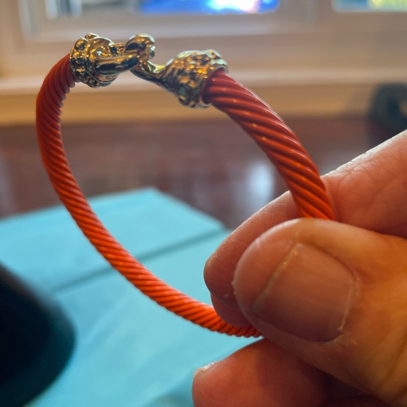 Cable twist bangle with gold tone closure. - Picture 3 of 3